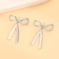 Elegant silver bow-knot tassel drop earrings with polished metallic finish for women - Long Bowknot Tassel (11240) / Silver