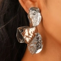 Artistic silver pleated flower earrings with metallic hammered texture on model - Silver Three Segment Spliced Style (N-716)