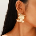Close-up of golden double flower earrings with brushed texture on model's ear - Double Layer Flower Earrings (9836) / White K/Silver