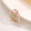 Elegant rose gold laurel leaf ring with a round brilliant-cut sparkling simulated diamond - Adjustable Open Design / Rose Gold Tone (Copper)