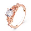 Elegant rose gold heart ring with round cubic zirconia and leaf pattern side stones - US 7 / Rose Gold