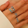Detailansicht des silbernen Ozean-Ring-Sets mit Meeresschildkröten, Seesternen und Muscheln - Innendurchmesser 1,8 cm (Verstellbar) / Ozean 4er-Set (N-1055) / Antiksilber