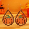 Macro detail of wooden teardrop earrings with orange pumpkin inlay for Halloween style - Pumpkin (N-280)