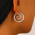 Close-up of a silver spiral vortex earring shown on model in a minimalist luxury style - Stainless Steel White K Earrings (10292)