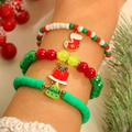 Dettaglio del set di braccialetti natalizi con ciondoli festivi e perline di argilla colorate - Campana 3 Pezzi (05)