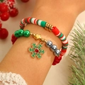 Détail du bracelet de Noël avec pendentif flocon de neige vert et breloque étoile dorée - Flocon de Neige 2-Pièces (01)