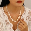 Bohemian style necklace with white sea shells and handcrafted knotted cord on model - 海螺项链(0687) / White