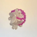 Detail of pink beaded handmade ring featuring matte white flower charms with silver core - White Lily (1042)