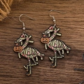 Close-up of Halloween wooden flamingo earrings featuring mummy bandages and pumpkin lantern - Wooden Flamingo Mummy Design (01 Wood Ostrich 6917)
