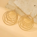 Gold layered concentric circular earrings with twisted rope texture and hook closure - Wavy Big Round Style (5212)