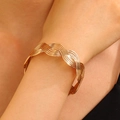 Rose gold braided wave bracelet featuring a minimalist multi-strand metal wire design - Rose Gold Woven Wave Bracelet (33)