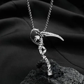 Gothic skull with scythe reaper pendant in silver finish on a dark volcanic rock background - Grim Reaper Scythe Style (N-474)