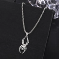 Silver punk necklace with spider and skull pendant on textured jewelry box - Spider Skull Style (11419)