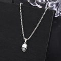 Silver punk skull pendant necklace with retro steel finish on a polished box chain - Hollow Skull Style (11421)