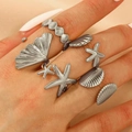 Adjustable silver starfish and seashell ring set with matte textured nautical charms - Ocean 5-Piece Style (16) / 5 Pieces / Silver