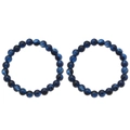 Detailopname van twee donkerblauwe kralenarmbanden met hemelse sterpatroon glans textuur - Sterrenhemel Donkerblauw