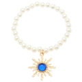Detailed macro view of white pearl bracelet with gold sun pendant and blue gemstone - Blue Sun Pendant Artificial Pearl Style / KC Gold Blue (S442)