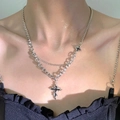 Close-up of double-layer chain necklace with black cross and star pendant for men - White K Layered Cross Star (A-197)