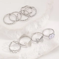 9-teiliges silbernes Ring-Set mit Schmetterling, Herz und Blumen auf weißem Stein - Silber Schmetterling Emaille Blume Stil (5356)