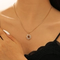 Golden sunburst necklace with oval tiger eye stone and crystals on a model - Round Sunburst Style (2123)
