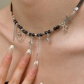 Y2K punk style black beaded choker with silver star pendants and long rhinestone tassels - Black Beaded Star Cross Tassel (0763)
