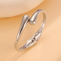 Detailed close-up of a polished silver-finish hinged cuff bracelet with water drop design - Overlapping Double Waterdrop Open Bangle (8856) / Silver