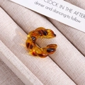Vintage amber resin ear cuff with leopard print texture and twisted spiral design - Spiral Twist Ear Cuff (X763) / Amber