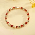Elegante pulsera trenzada en tono dorado con cristales rojos y blancos alternados - Estilo Alterno de Piedras Rojas y Blancas (1034)