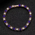 Elegante pulsera tennis de oro rosa con piedras azules y cristales blancos alternos - Estilo Alterno de Piedras Azules y Blancas (DZ-320)
