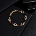 Pulsera de oro rosa con corazón, piedras negras en gota y circonitas blancas en caja negra - Estilo de Pera Corazón Negro (10831)