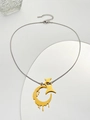 Macro detail of golden lava moon and star pendant on a minimalist snake chain - Lava Moon Star Necklace (M-298) / Gold