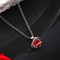 Sparkling silver crown heart pendant necklace with red zircon and crystal accents - Heart Planet (10219)