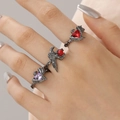 Gothic punk black metal rings set featuring red heart crystals and bird motif - Raven Combination (Set of 3)