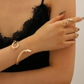 Adjustable golden snake jewelry set featuring detailed scale textures and serpent design - Bracelet and Ring Set in Gold WG-0875