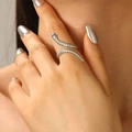 Adjustable snake ring in bright silver finish with detailed scale texture on model - Snake Ring (M-442) / Silver