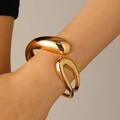 Minimalist wide gold-plated open cuff bracelet with thick organic teardrop curves for women - Single Water Drop Bangle (9130) / KC Gold