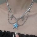 Detail of layered silver necklaces with blue enamel star pendant and crucifix charms - White Gold Plated Alloy Z-072 (13 White Gold Alloy)