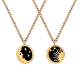 Magnetic sun and moon couple necklace set with gold trim and black enamel finish - Sun Moon Round Tag Style (DZ057)