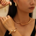 Minimalist gold-plated jewelry set with teardrop earrings and a sleek spring cuff - Choker+Bangle+Earrings Set / Gold