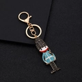 Llavero de guardia real británica con diamantes de imitación brillantes y oro - Azul