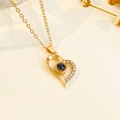Golden heart projection necklace with white cubic zirconia and delicate chain - KC Gold Half Pave Rhinestone Heart Style (3455)