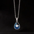 Water-drop necklace with deep blue enamel, white pearl, and silver chain on black fabric - Wave Pearl N-855 Teardrop Blue Enamel Pearl