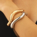 Minimalist geometric wave bangle set in polished gold and silver finishes - Two Piece Bangle Set / Gold and Silver Two-tone