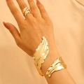 Elegant gold leaf ring and wide cuff bracelet set with a polished finish for women - Bracelet and Ring Set in Gold (A-135+A-181)