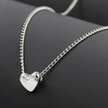 Elegante collar de corazón plateado con acabado pulido espejo en una cadena delgada - Plata 2007