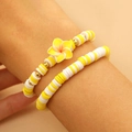 Conjunto de pulseras de cuentas Heishi amarillas y blancas con flor de hibisco - Pulsera de Cuentas Amarilla y Blanca