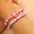 Set de pulseras de cuentas Heishi coloridas con dije de flor rosa y oro fino - Pulsera de Dijes de Flores Macaron