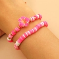 Set de pulseras de cuentas Heishi rosa y blanco con dije de flor rosa y oro - Pulsera de Plumeria Rosa y Blanca