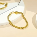 Polished golden twist rope chain bracelet with lobster clasp and round metal tag - Rope Chain (5547)