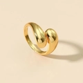 Macro shot of modern golden teardrop ring with highly polished mirror surface - Open Ring (12321) / 14K Gold